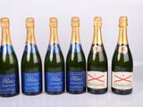 six bouteilles de champagne sont alignées