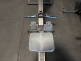 a machine that is sitting on the floor in the gym