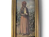 un vieux tableau représentant un homme coiffé d'un turban rouge, debout devant un champ de coton
