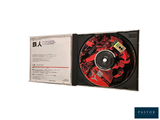 a cd in a case with a red design on it