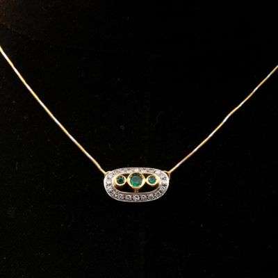Collier en or jaune et or gris 750 millièmes à maille serpen…