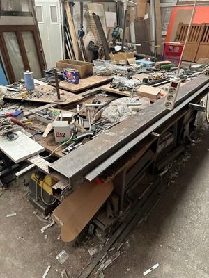 a lot of junk on the floor of a building