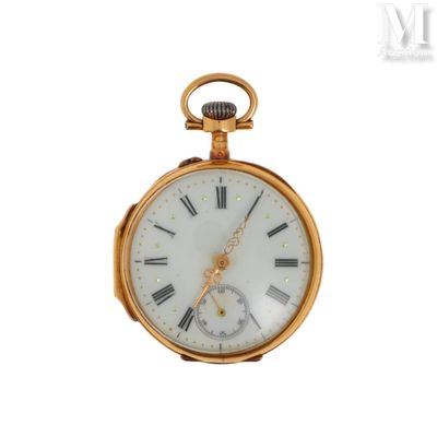 une montre de poche en or avec des chiffres romains sur le cadran