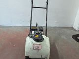 a small machine that is sitting on the floor
