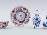 three pieces of chinese blue and white porcelain on a white background