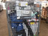 a large metal cart with a lot of items inside of it