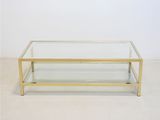 table basse en laiton avec plateau en verre