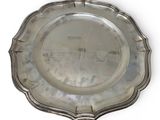 an antique silver plate on a white background with a white background