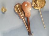 two wooden spoons and a wooden spoon rest on a table