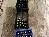 two crates of beer sitting next to each other on the floor