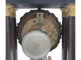a clock that is sitting on top of a table