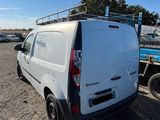 a white van that is parked in a lot
