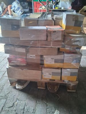 many boxes stacked on top of each other on a pallet