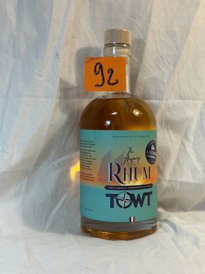 a bottle of rum that is sitting on a table