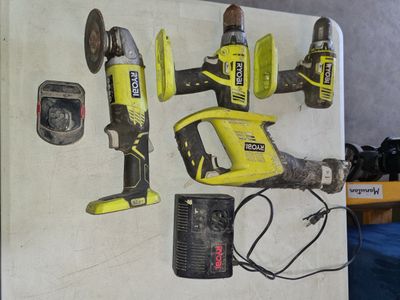a refrigerator with a bunch of tools on it