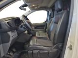 the interior of a white truck with black leather seats and a steering wheel