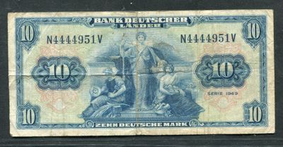 un ancien billet de banque allemand sur lequel figure le portrait d'un homme