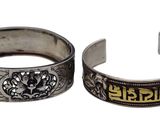 two silver and gold bang bracelets on a white background