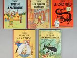 Quatre livres pour enfants sont alignés sur une table