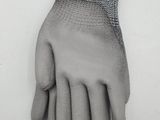 an image of a pair of gloves on a white surface