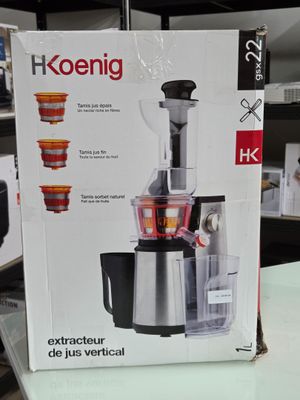 une boîte sur laquelle est représenté un extracteur de jus