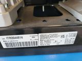a close up of the back of a machine with a barcode on it