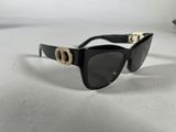 a close up of a pair of sunglasses on a table