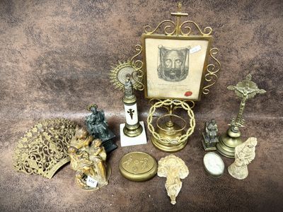 a picture of a collection of antique items on a table