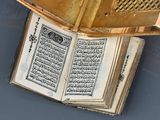 an open book sitting on top of a table