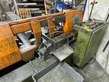 a picture of a machine that is working on a piece of wood