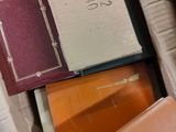 a box full of books sitting on top of a table