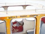 a close up of a small yellow boat with a red seat