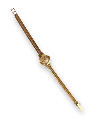 a gold watch on a white background with a white background