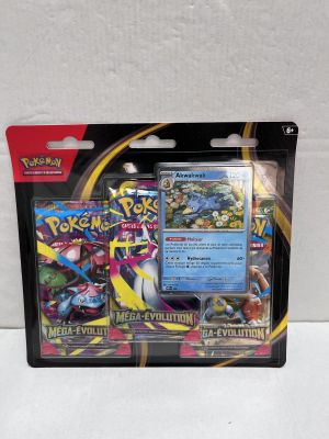 a close up of a box of pokemon cards on a white surface