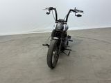 a motorcycle that is parked in a large room