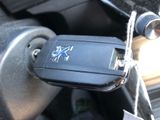 a close up of a car key in the center of a vehicle