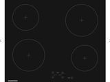 a black stove top with four burners and four knobs