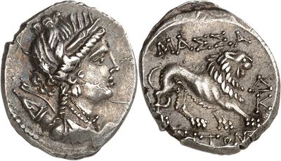 a silver coin with a dragon on the front and a lion on the back