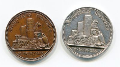 an image of a coin with a picture of a statue on it
