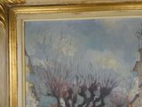 a painting on the wall of a building with a clock tower in the background