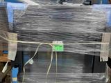 a pallet full of pallets of plastic and wrapped in plastic