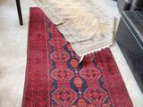 a rug on the floor in a living room