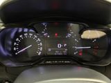 a close up of a car dashboard with a speedometer