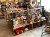 a room filled with lots of pots and other things