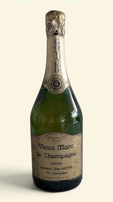 a bottle of champagne that is sitting on a table