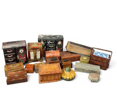 many different types of wooden boxes and boxes on the table