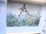 une image d'un tableau sur le mur d'une maison