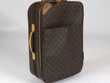 louis vuitton monogram canvas suitcase with wooden handles