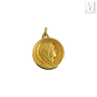 l'image d'une pièce d'or sur laquelle figure le visage d'une femme