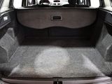 a trunk of a car with the back seats folded down
